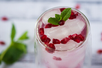 Pomegranate cocktail. Summer light alcoholic drink.