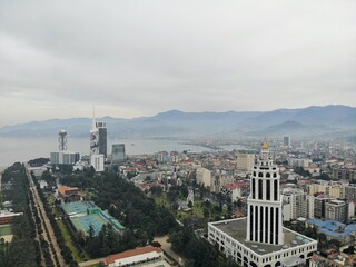 Fototapeta premium Batumi from above. Aerial photo from drone camera. Georgian seaside city. Beautiful town panoramic view.