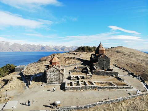 Sevan Lake and Sevanavank oldest church. Mountains country Armenia. Aerial view from above by drone.