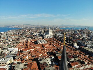 Fototapeta na wymiar Istanbul, culture and historical capital of Turkey. Aerial photo from above. City view and landscape photo by drone. Moscue Minaret tower