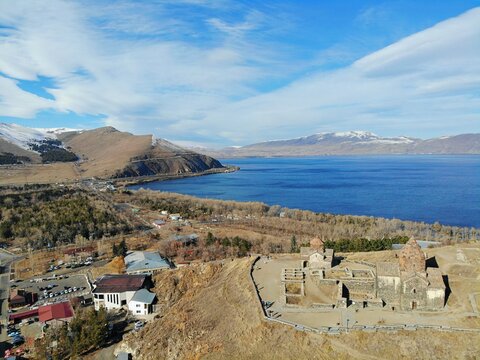 Sevan Lake and Sevanavank oldest church. Mountains country Armenia. Aerial view from above by drone.
