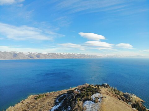 Sevan Lake and Sevanavank oldest church. Mountains country Armenia. Aerial view from above by drone.
