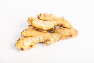 whole ginger on white background
