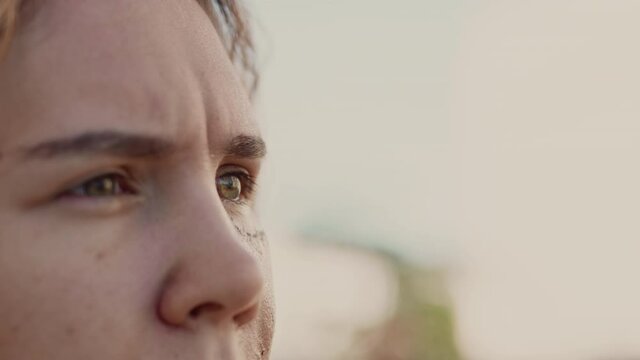 Young woman closeup portrait with scar on her face. Home violence victim. Scared girl in despair shaming of her wound. Abusive family relationship and crime concept. Social problem.