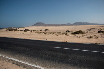 
lonely road through the desert
