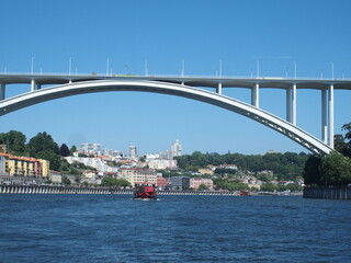 Fototapeta premium Eine der vielen Brücken über den Douro in Porto Portugal One of the countless bridges across the Douro river in Porto Portugal