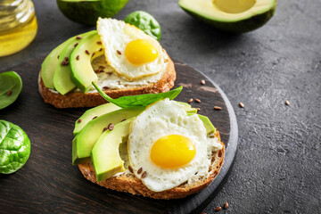 Avocado sandwiches with fried eggs