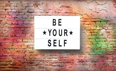 Fototapeta na wymiar be your self on Colorful brick wall