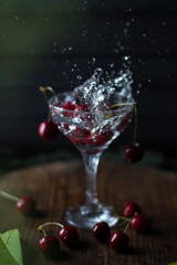  Cherries in a glass of water, splash