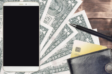 1 US dollar bills and smartphone with purse and credit card. E-payments or e-commerce concept....