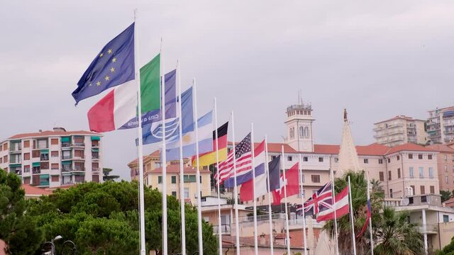 World flags at slow motion. EU European Union countries. Italy, France, Germany, United Kingdom UK, Austria, Swittzerland. USA flag United States of America. Argentine.