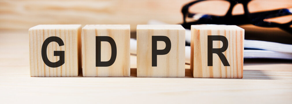 GDPR written on wooden cubes against white background