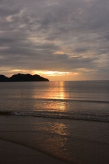 The sunrise view against the golden yellow sky