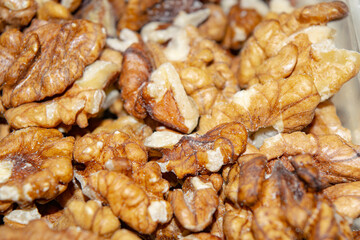 Peeled walnuts close-up. Surface texture. Healthy diet.