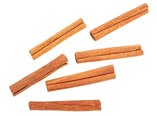 Cinnamon sticks isolated on a white background, top view. Fragrant cinnamon sticks. Cinnamon bark.