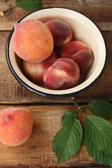Juicy peaches on a wooden table macro 