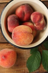 Juicy peaches on a wooden table macro 