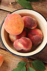 Juicy peaches on a wooden table macro 