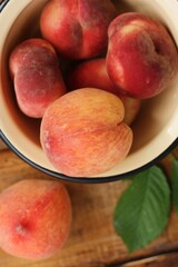 Juicy peaches on a wooden table macro 
