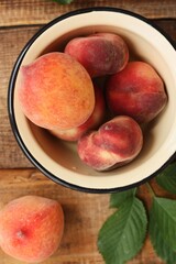 Juicy peaches on a wooden table macro 