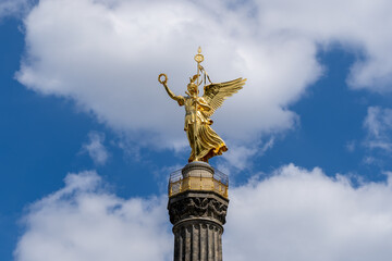 Fototapeta na wymiar Berlin, Germany memorial monument Victory Column called Siegessäule close up of golden statue