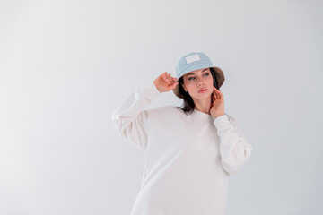 Portrait beautiful adult sports girl model on white background. hoody. logo.