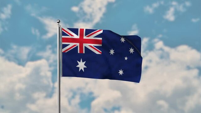Australia flag waving in the blue sky realistic 4k Video.