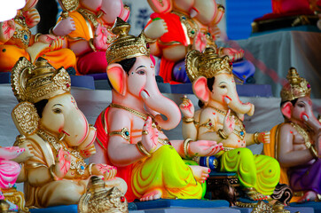 Decorated shops and idols for Ganesha Festival in India.