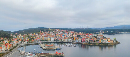 Naklejka na ściany i meble Aerial view in Camarinas. Galicia. Coastal town with boats in Spain