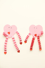 Cardboard heart pink couple in isolated white background, Sao Paulo, Brazil