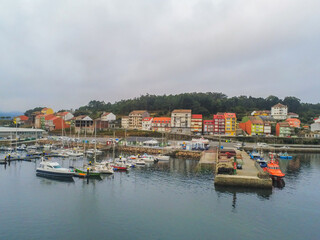 Fototapeta na wymiar Aerial view in Camarinas. Galicia. Coastal town with boats in Spain