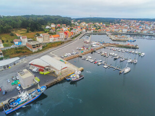Fototapeta na wymiar Aerial view in Camarinas. Galicia. Coastal town with boats in Spain
