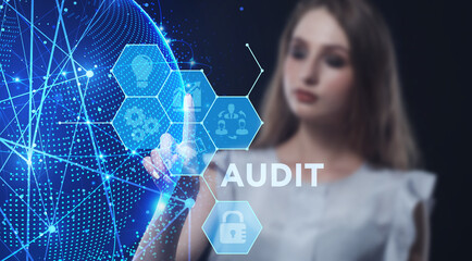 Business, Technology, Internet and network concept. Young businessman working on a virtual screen of the future and sees the inscription: Audit