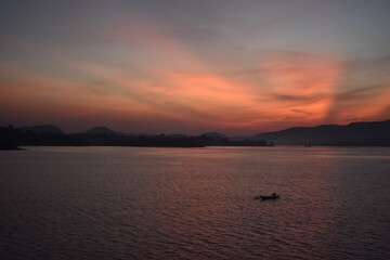 Obraz premium sunset on the river