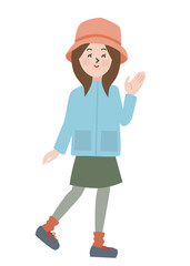 笑顔で案内ポーズをするアウトドアスタイルの若い女性