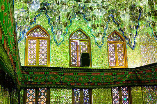 SHIRAZ, IRAN - NOVEMBER 22, 2016: Mirrored interior of Ali Ibn Hamza shrine in Shiraz. Traditional decorative work in a mosaic of mirror glass.