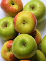 Ripe green Granny Smith and red Braeburn apples detail 