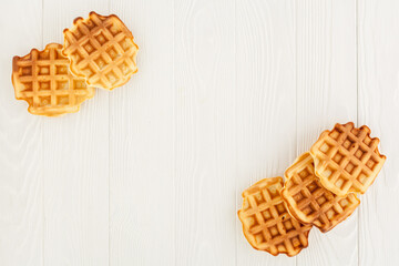 belgian waffles on wooden background top view mockup