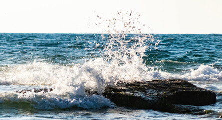 water splash on rocks
