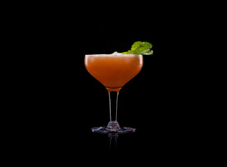 Champagne, mint, and aged rum cocktail.