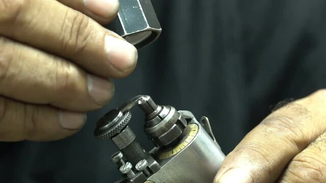 Lapidary is cutting diamonds. Close up cutting diamond hand made. macro shooting. Lapidary looking diamond loop. macro video