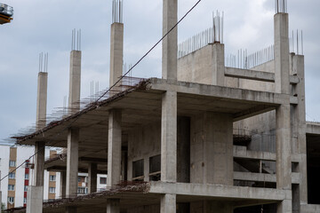 Sticking out reinforcement at the construction site of a new house.