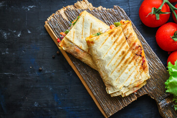 tortilla or burrito wrap stuffing vegetables vegetarian pita bread Menu concept Takeaway serving size. food background top view copy space organic 