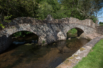 Fototapeta na wymiar Lovers Bridge over the River Avill in the Exmoor town of Dunster, Somerset UK