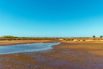 Small lake in the dunes next to the beach in Alvor in Portimão - Portugal