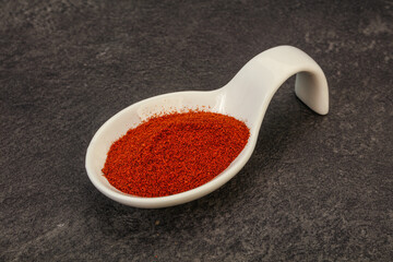 Dry paprika powder in the bowl