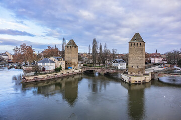 Obraz premium Strasbourg Ponts Couverts (or covered bridges) over Ill River. Ponts Couverts set of three bridges and four towers that make up a defensive work erected in XIII century. Strasbourg, Alsace, France.
