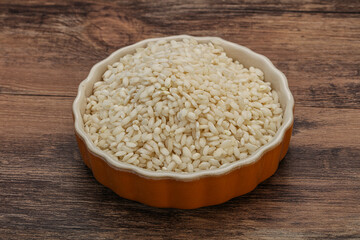 Obraz na płótnie Canvas Raw arborio rice for Risotto
