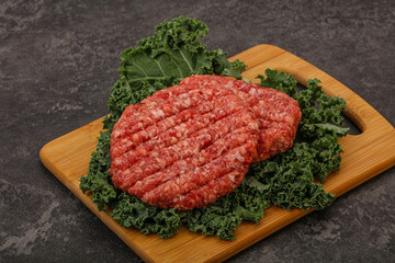Raw beef burger cutlet for cooking