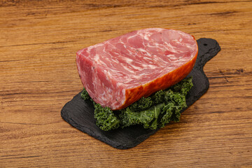 Beef ham piece over board